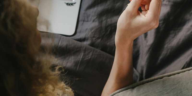 Woman Holding a Credit Card